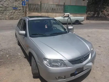 مزایده خودرو مزدا، 323 اتوماتیک