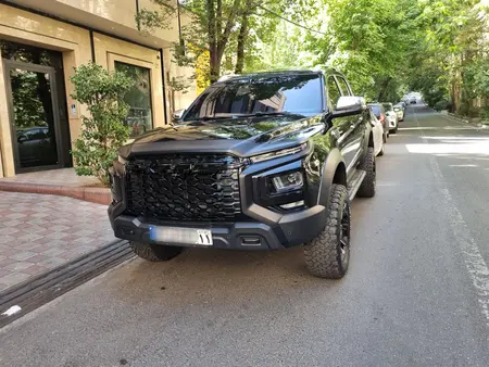 مزایده خودرو کی ام سی، T9 2 لیتر توربو